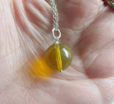 Dominican Blue Amber Bead Sphere Pendant Necklace